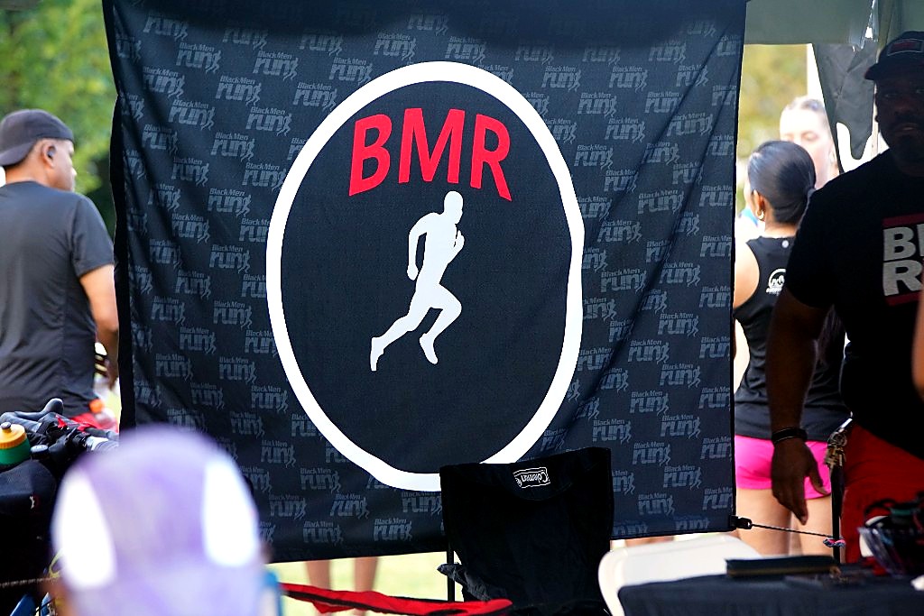 Black Men Run banner with a running figure and the letters BMR