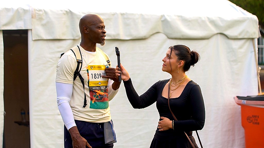 Virginia Union student Brayden Kaminski interviewing Djimon Hounsou at Abner Clay Park