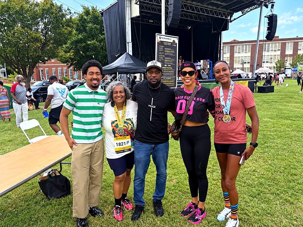 Mekhi McGainey, Dean Hollee Freeman, Prof. CJ Nurse, Jay Ell Alexander, and Sika Henry standing together at Abner Clay Park