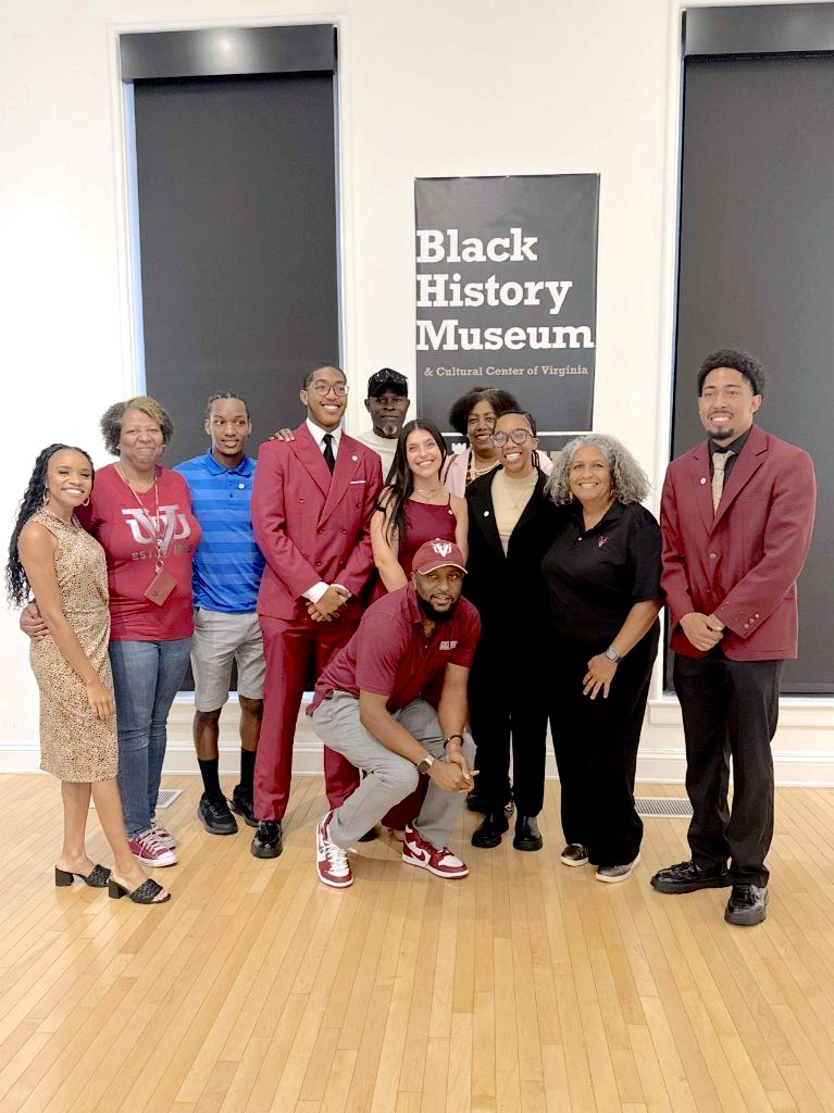 Virginia Union University students and faculty posing with Djimon Hounsou at the Black History Museum